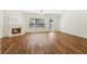 Spacious living room featuring a cozy fireplace and abundant natural light at 2075 Pine Tree Dr # D4, Buford, GA 30518