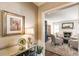 Cozy living room with fireplace view from entry, paired with hardwood floors and designer wallpaper at 2083 Golfview Dr, Atlanta, GA 30309