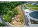 Comprehensive aerial view showcasing the community's playground, amphitheater, and recreational amenities at 5079 N Dogwood Hills Dr, Buford, GA 30518