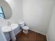 Bathroom featuring modern pedestal sink and fixtures at 807 Ambient Sw Way, Atlanta, GA 30331