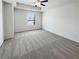 Spacious bedroom with plush carpeting, ample natural light, and neutral color scheme at 807 Ambient Sw Way, Atlanta, GA 30331