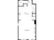 Layout of the first floor, featuring a spacious living room, kitchen, and storage area at 807 Ambient Sw Way, Atlanta, GA 30331