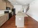 Modern kitchen featuring granite countertops, stainless steel appliances and hardwood floors at 807 Ambient Sw Way, Atlanta, GA 30331