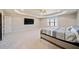 This bedroom features a ceiling fan, large window for natural light, and a comfortable bed, creating a serene space at 1118 Reddy Farm Rd, Grayson, GA 30017