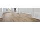 Spacious living area featuring hardwood floors, elegant moldings, and abundant natural light, creating a warm ambiance at 1118 Reddy Farm Rd, Grayson, GA 30017
