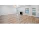 Spacious living room with a fireplace and natural light from the windows at 1118 Reddy Farm Rd, Grayson, GA 30017