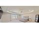 Large main bedroom with carpet floors, ceiling fan, and a large mirror at 1118 Reddy Farm Rd, Grayson, GA 30017