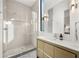 Modern bathroom featuring a glass-enclosed shower and sleek vanity with ample counter space at 1260 Brook Forest Ne Dr, Atlanta, GA 30324