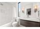 Modern bathroom with a shower, vanity, and stylish lighting at 1260 Brook Forest Ne Dr, Atlanta, GA 30324