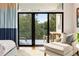 Bright bedroom featuring a sliding glass door with an outdoor seating area at 1260 Brook Forest Ne Dr, Atlanta, GA 30324