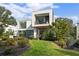 Contemporary home exterior with a well-maintained lawn, modern architecture, and inviting curb appeal at 1260 Brook Forest Ne Dr, Atlanta, GA 30324