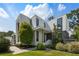 Modern two-story home with clean lines, large windows, and professional landscaping at 1260 Brook Forest Ne Dr, Atlanta, GA 30324