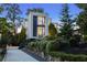 Modern house exterior with clean lines, manicured landscaping, and a welcoming walkway, perfect for curb appeal at 1260 Brook Forest Ne Dr, Atlanta, GA 30324