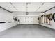 Organized garage featuring epoxy flooring, ample storage solutions, and a clean, clutter-free space at 1260 Brook Forest Ne Dr, Atlanta, GA 30324