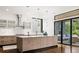 Modern kitchen with custom cabinets, an island, and stainless steel appliances at 1260 Brook Forest Ne Dr, Atlanta, GA 30324