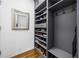 Well-organized mudroom with gray built-in shelving, hooks, and a convenient bench at 1260 Brook Forest Ne Dr, Atlanta, GA 30324