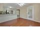 Charming space with hardwood floors, a kitchen view and exterior access at 1150 Strath Clyde Way, Mcdonough, GA 30253
