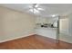 Cozy dining space with hardwood flooring, neutral walls, and ample sunlight at 1150 Strath Clyde Way, Mcdonough, GA 30253