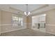 Elegant dining room adjacent to the kitchen, perfect for entertaining guests at 1150 Strath Clyde Way, Mcdonough, GA 30253