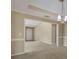 Open living room featuring neutral paint, plush carpeting, and ample natural light at 1150 Strath Clyde Way, Mcdonough, GA 30253