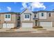 Charming new townhome boasts a one-car garage and stylish exterior finishes at 308 Shine Dr, Stockbridge, GA 30281