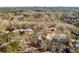 Aerial view of a home nestled among trees in a suburban neighborhood at 501 Brook Hollow Se Cir, Marietta, GA 30067