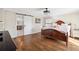 Bright main bedroom with hardwood floors, an ensuite bathroom, and a large window at 501 Brook Hollow Se Cir, Marietta, GA 30067