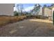 Large backyard with privacy fence and potential for landscaping at 1225 Sand Knoll Sw Run, Lilburn, GA 30047