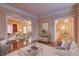 Bright and airy living room with hardwood floors and elegant furnishings at 1225 Sand Knoll Sw Run, Lilburn, GA 30047