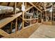 Unfinished attic featuring exposed wooden beams and metal ducts at 1350 Bluestone Dr, Cumming, GA 30041