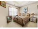 Bedroom with a bed, sitting chair and a view to the backyard at 1350 Bluestone Dr, Cumming, GA 30041