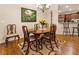 Formal dining room with hardwood floors, chandelier, and comfortable seating at 1350 Bluestone Dr, Cumming, GA 30041