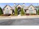 Attractive building exterior with manicured landscaping and covered entryway at 1350 Bluestone Dr, Cumming, GA 30041