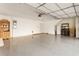 A spacious, clean garage with epoxy flooring and ample storage at 1350 Bluestone Dr, Cumming, GA 30041