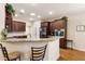 Bright kitchen with granite counters, stainless appliances, and ample cabinet space at 1350 Bluestone Dr, Cumming, GA 30041