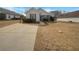 Charming single-story home featuring a well-maintained front yard and a cozy entrance at 207 Autumn Lake Way, Mcdonough, GA 30253