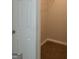 Small walk-in closet with carpeted floor and wire shelving at 2627 Evans Mill Dr, Lithonia, GA 30058