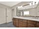 This bathroom features granite countertops and dual sinks with shaker cabinets at 4314 Deep Springs Nw Ct, Kennesaw, GA 30144