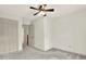This bedroom features a closet, neutral paint, carpeted floor and a ceiling fan at 4314 Deep Springs Nw Ct, Kennesaw, GA 30144