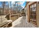 Relaxing deck area with built-in bench seating, perfect for outdoor entertaining overlooking a wooded area at 4314 Deep Springs Nw Ct, Kennesaw, GA 30144