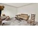 Living room with neutral walls, carpet flooring, traditional furniture, and natural light at 4314 Deep Springs Nw Ct, Kennesaw, GA 30144