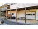 Covered outdoor patio features a paved stone floor and offers access to the garage at 4314 Deep Springs Nw Ct, Kennesaw, GA 30144