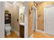 Powder room with elegant cabinet, lighting and decorations at 4010 Tamarack Nw Dr, Kennesaw, GA 30152