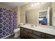 Bathroom featuring a shower with patterned curtain and a vanity with a white countertop at 4010 Tamarack Nw Dr, Kennesaw, GA 30152