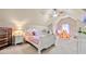 Large bedroom with vaulted ceilings and a whimsical decor that creates a playful atmosphere at 4010 Tamarack Nw Dr, Kennesaw, GA 30152