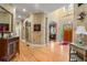 Grand foyer with a high ceiling, hardwood floors, and decorative arches leading into the home at 4010 Tamarack Nw Dr, Kennesaw, GA 30152