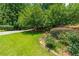 Well-maintained front lawn and shrubs in a desirable neighborhood at 4010 Tamarack Nw Dr, Kennesaw, GA 30152