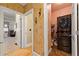 Modern laundry room featuring a stacked washer and dryer and tile flooring at 4010 Tamarack Nw Dr, Kennesaw, GA 30152