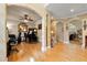 Spacious living area showcasing hardwood floors, archways, and multiple seating areas at 4010 Tamarack Nw Dr, Kennesaw, GA 30152