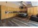 Spacious living area with hardwood floors, ample cabinet storage, and a cozy dining table at 4010 Tamarack Nw Dr, Kennesaw, GA 30152